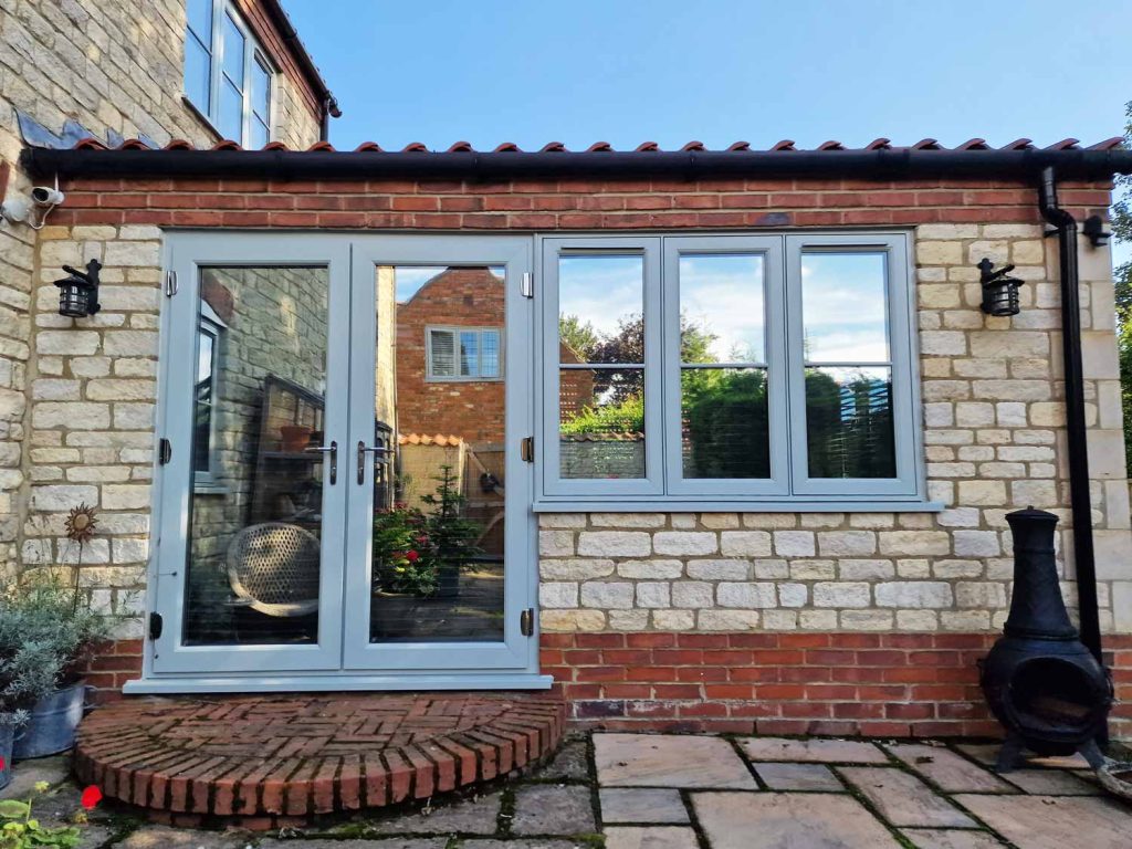 External view french doors and windows, all with privacy glass. 