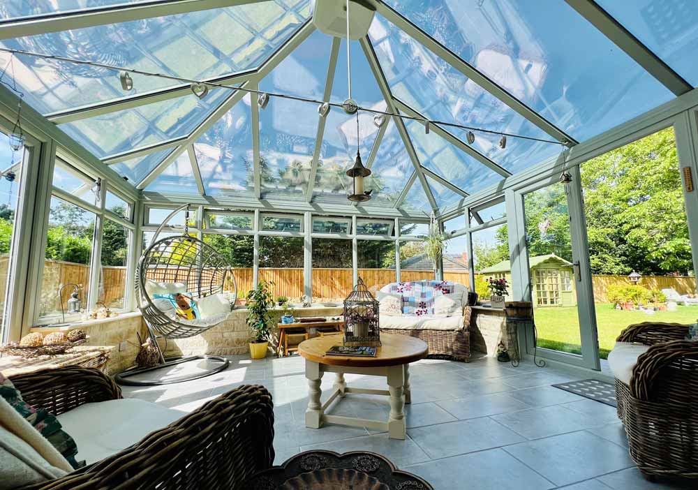 Internal view of a conservatory and all furnishings. 